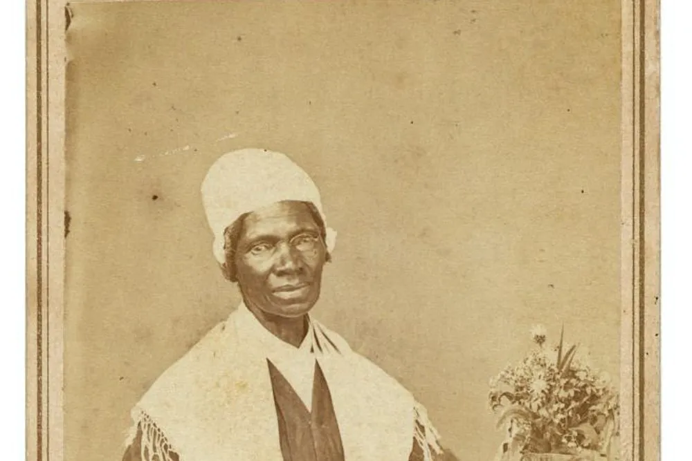 Sojourner Truth seated for a studio portrait, around 1864