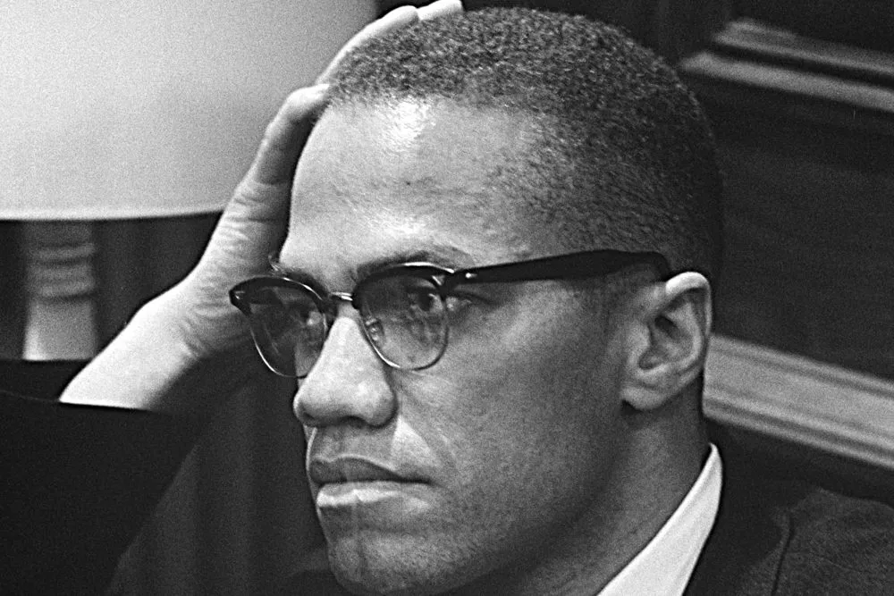Malcolm X at a press conference in 1964